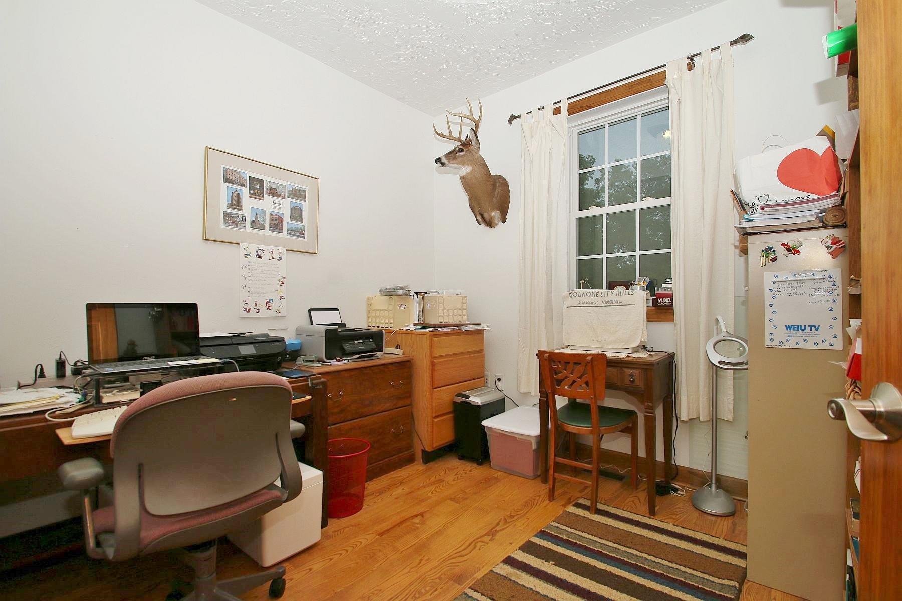 7988 Mayland Road Roanoke, VA 24014 - Photo 44 of 63 a view of a workspace with furniture and a window