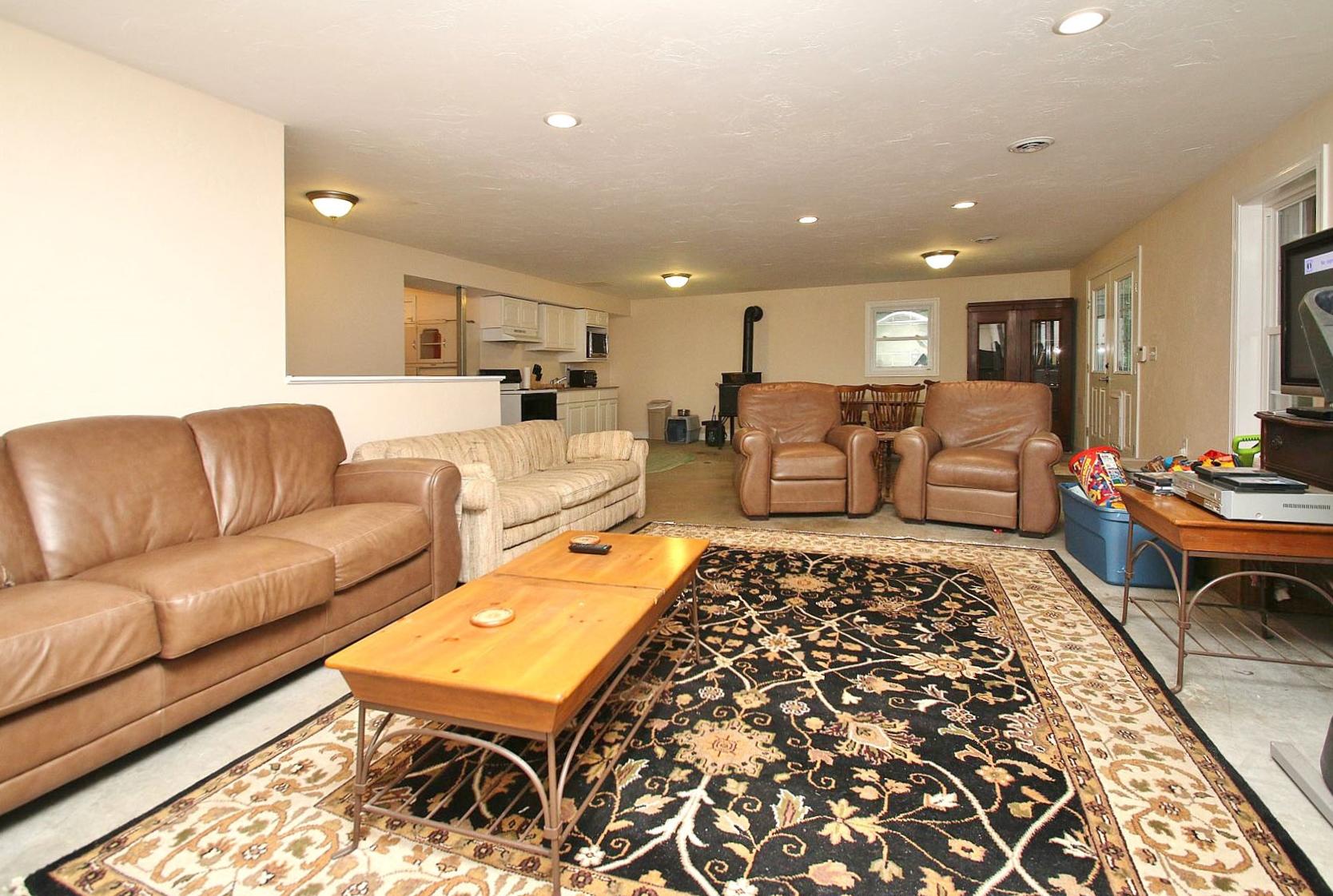 7988 Mayland Road Roanoke, VA 24014 - Photo 50 of 63 a living room with furniture and a rug