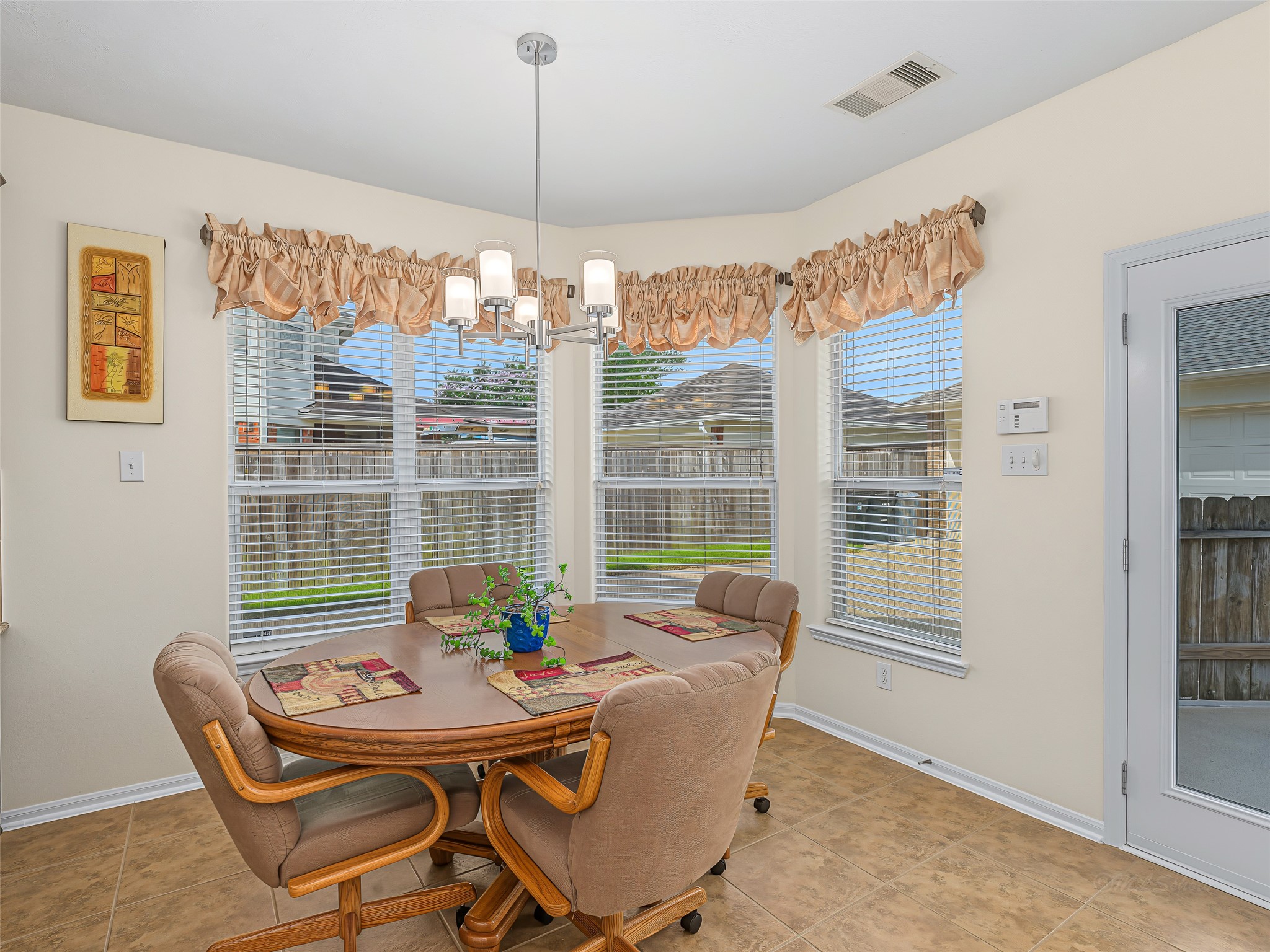 2210 Fox Path Katy, TX 77494 - Photo 17 of 47 Perfectly positioned right off the kitchen and family room, this inviting casual dining area serves as a wonderful space for daily family meals.