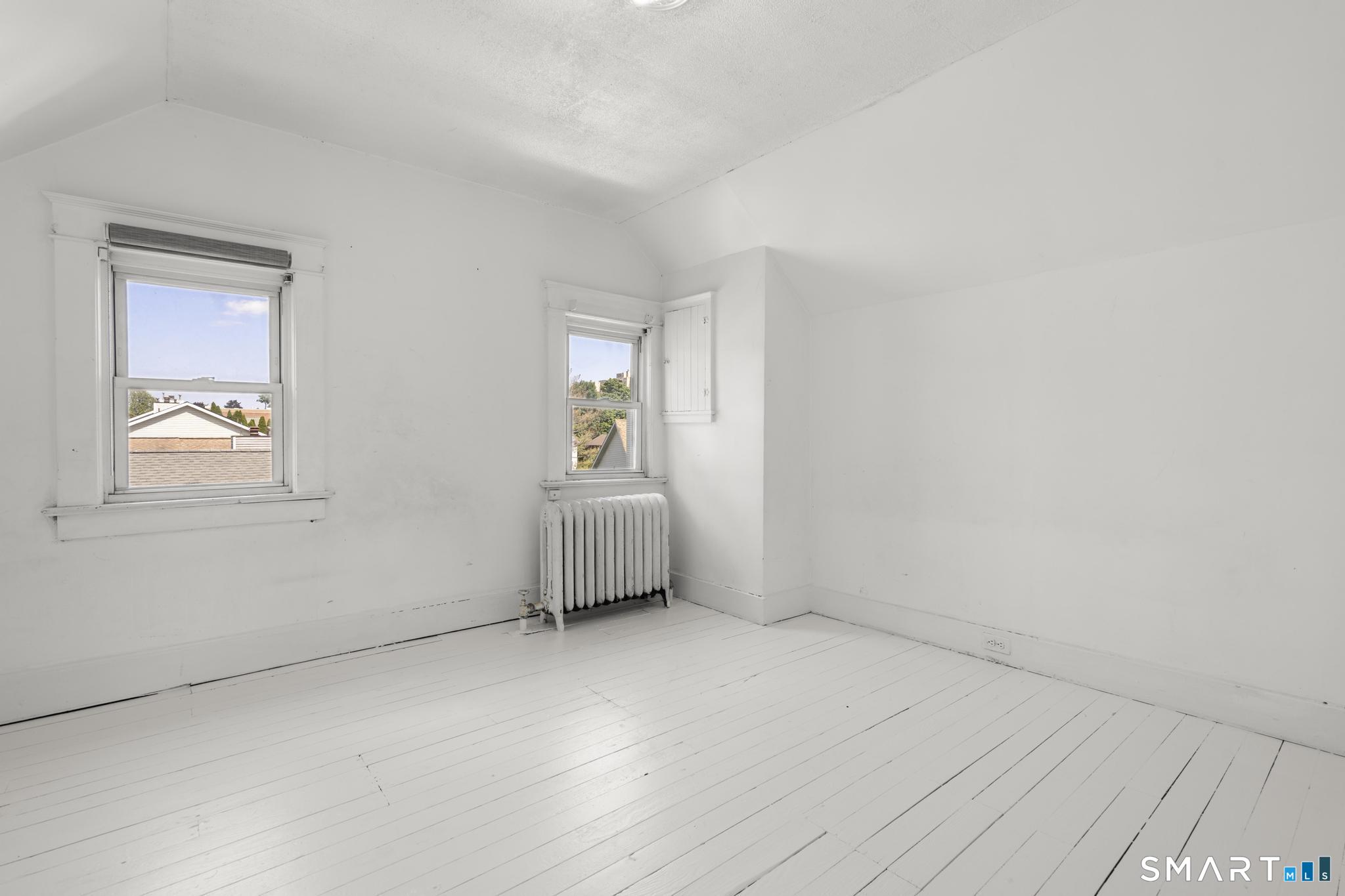151 5th Street Stamford, CT 06902 - Photo 31 of 40 4th bedroom in the walk-up attic