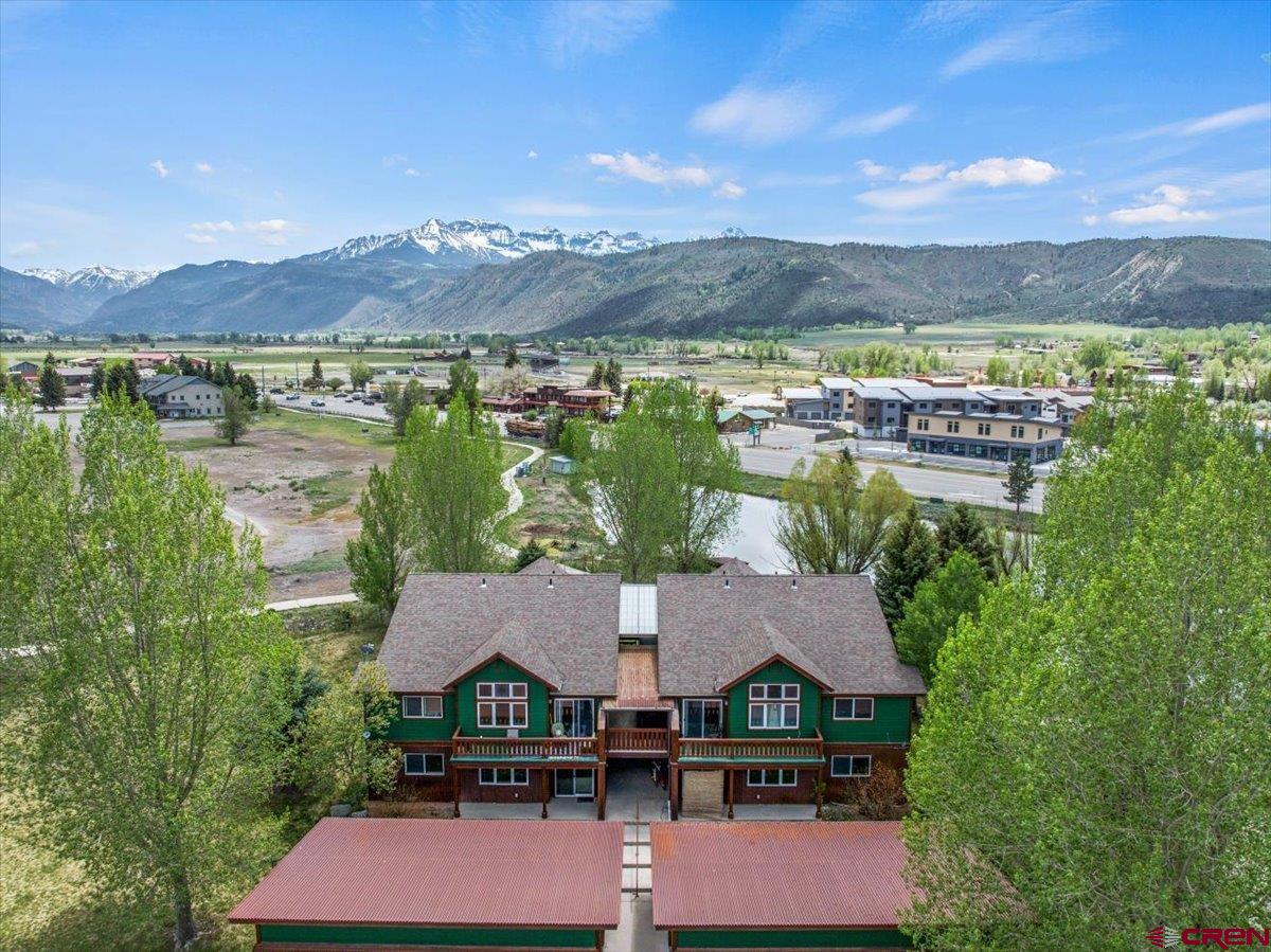 520 Redcliff Circle, Unit G203 Ridgway, CO 81432 - Photo 22 of 25 a view of a city with lake view