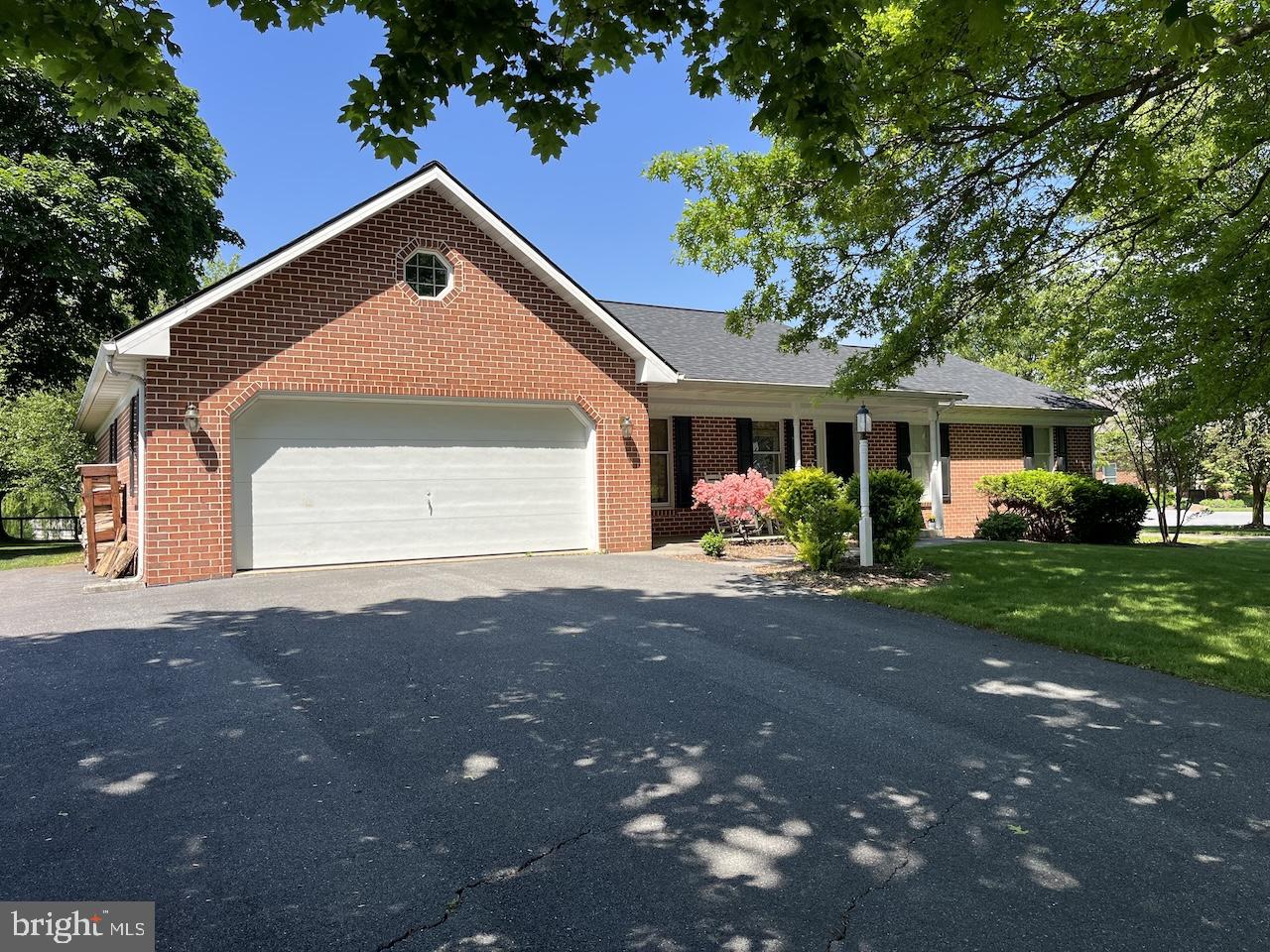 678 North Strickler Road Manheim, PA 17545 - Photo 8 of 54 a front view of a house with a yard and a garage