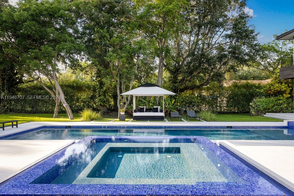 6850 Southwest 73rd Court Miami, FL 33143 - Photo 35 of 52 a view of swimming pool with lounge chair