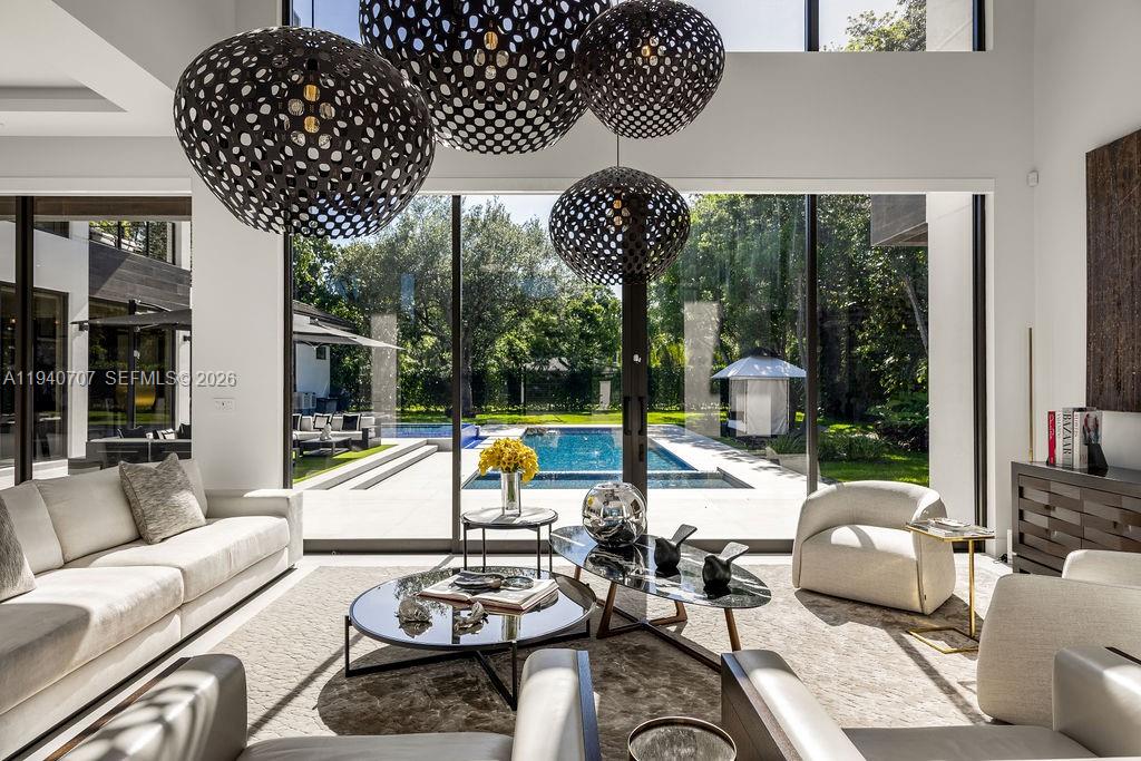 6850 Southwest 73rd Court Miami, FL 33143 - Photo 6 of 52 a living room with furniture and a large window