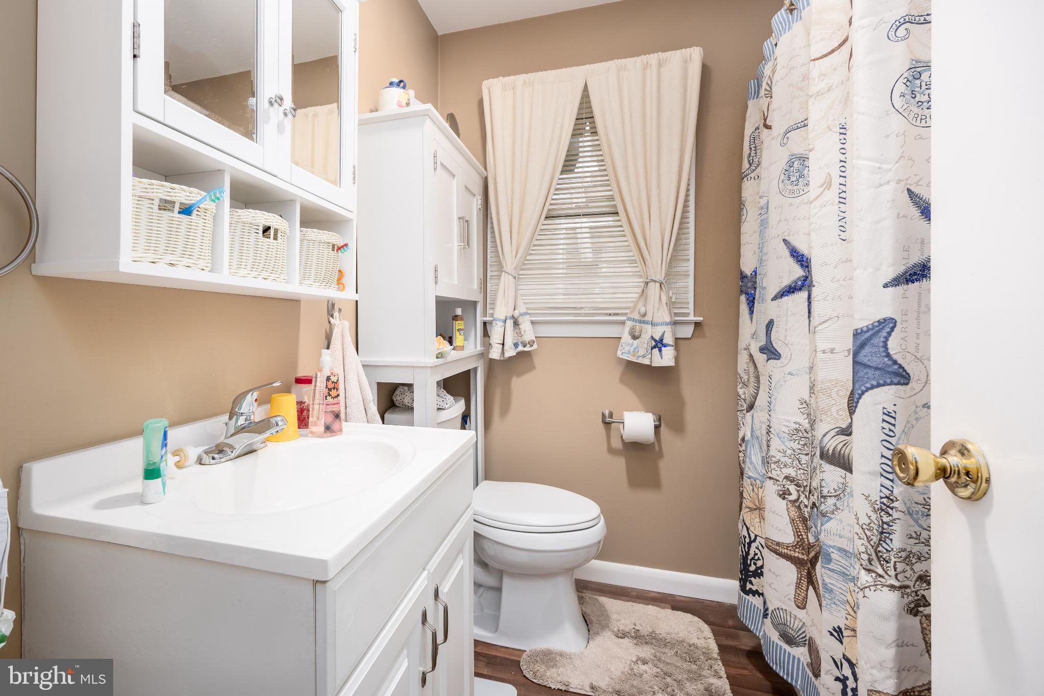 136 Marvel Road Salisbury, MD 21801 - Photo 17 of 42 a bathroom with a sink toilet and shower