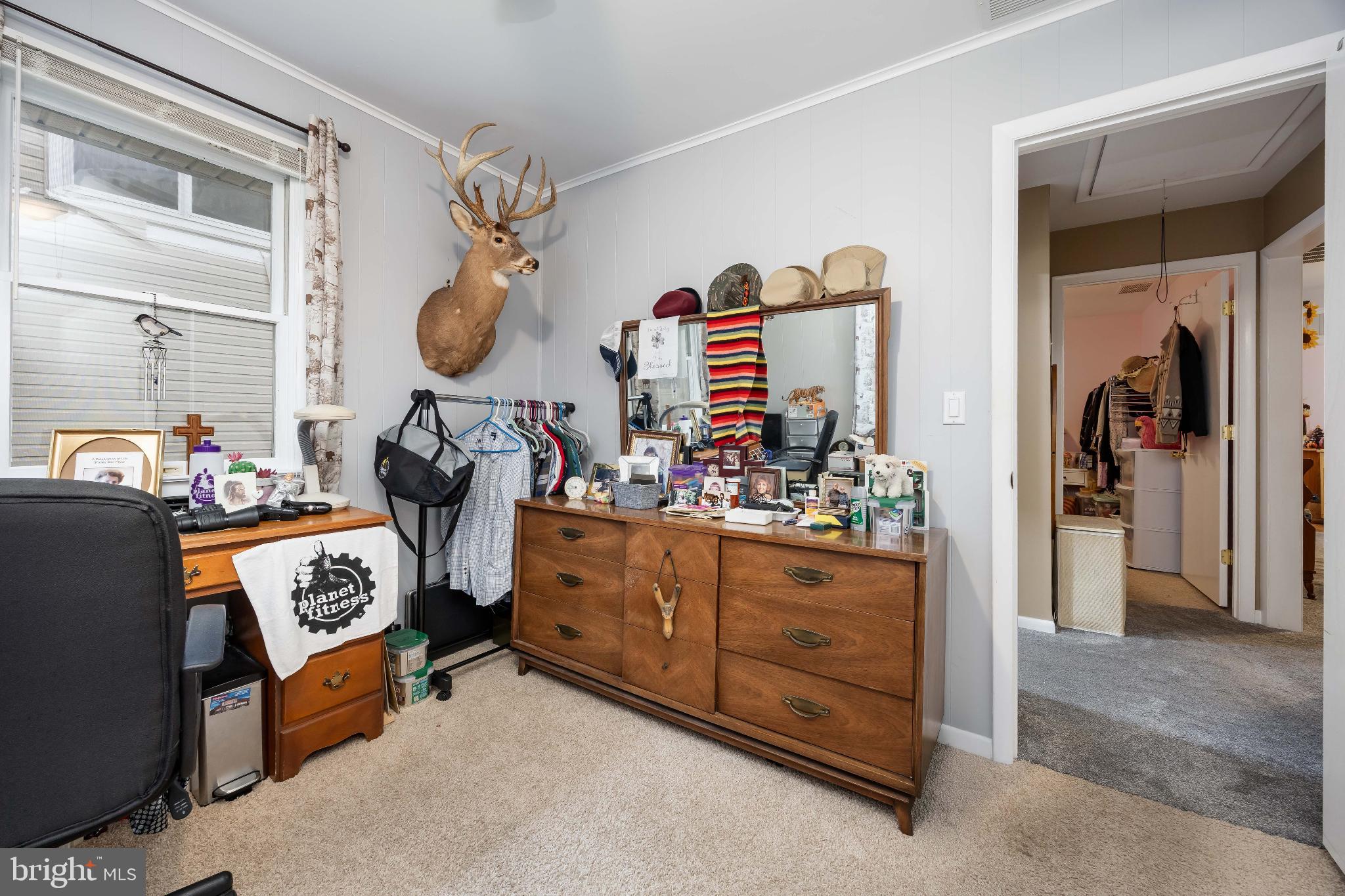136 Marvel Road Salisbury, MD 21801 - Photo 20 of 42 a bedroom with a bed and wooden floor