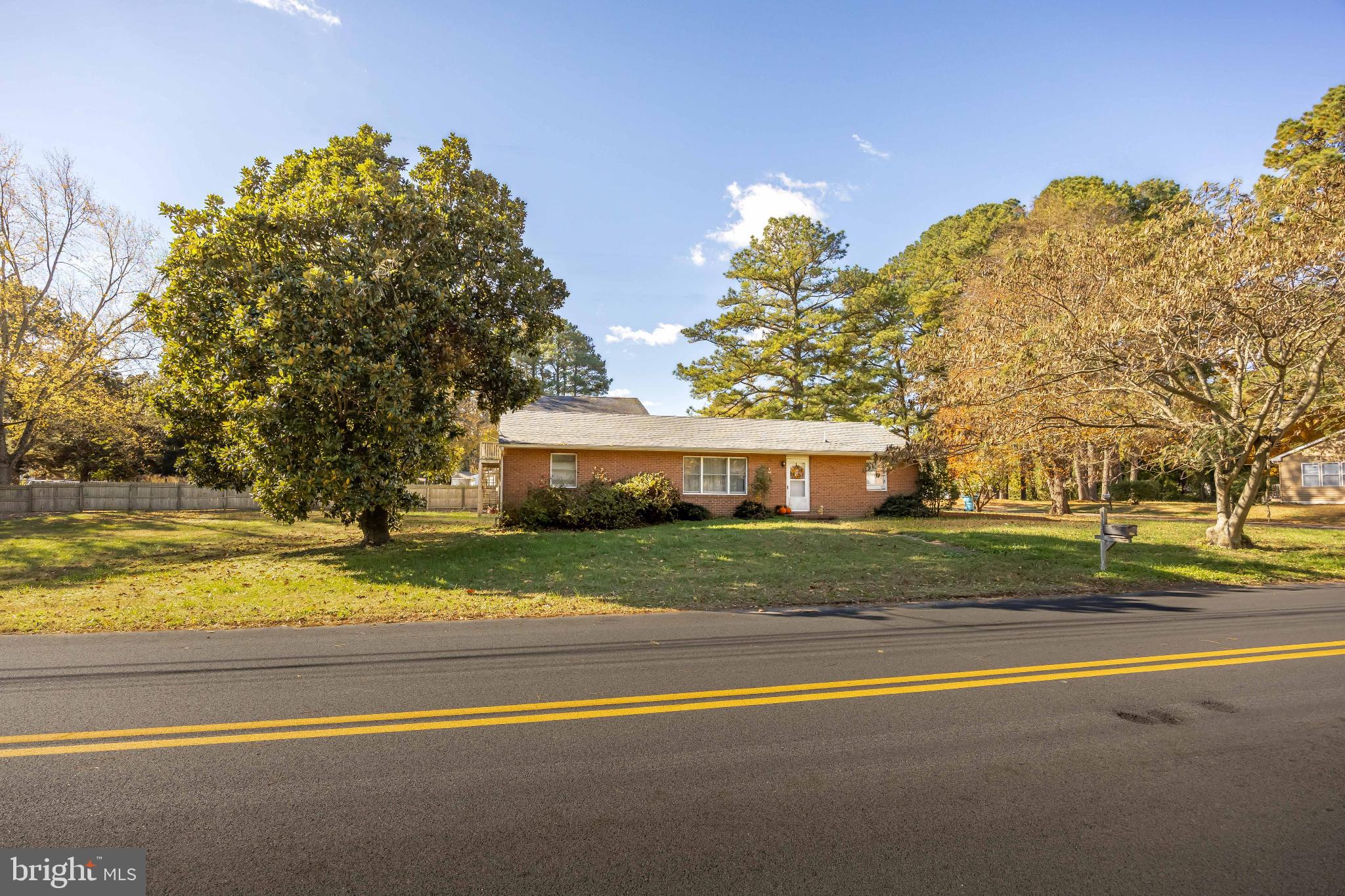 136 Marvel Road Salisbury, MD 21801 - Photo 2 of 42 a view of a house with a big yard and large trees