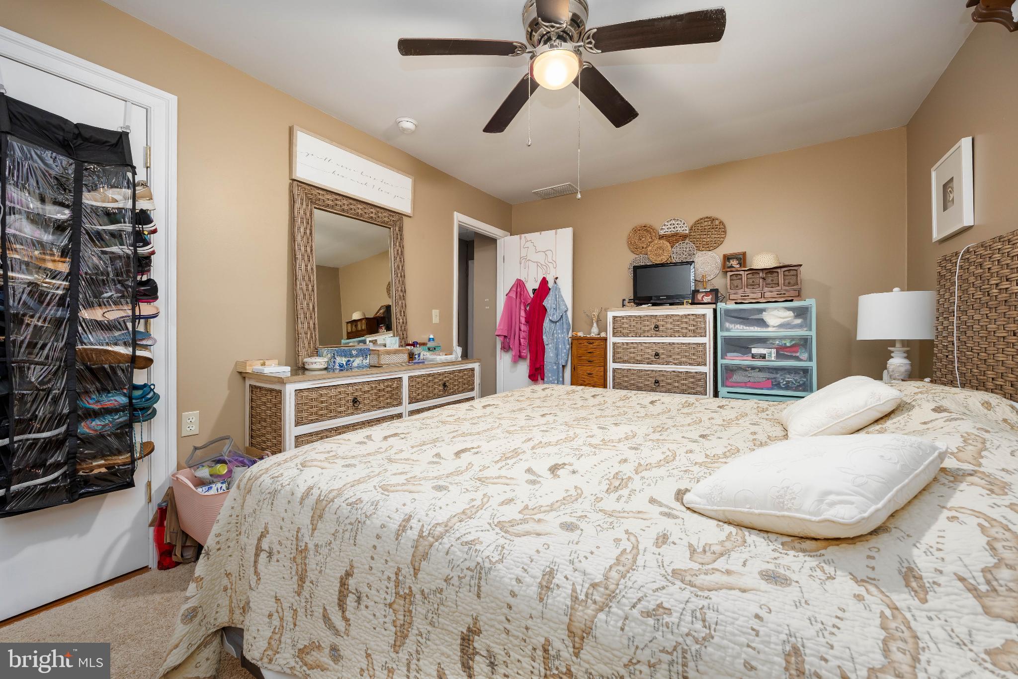 136 Marvel Road Salisbury, MD 21801 - Photo 23 of 42 a bedroom with a bed and a dresser