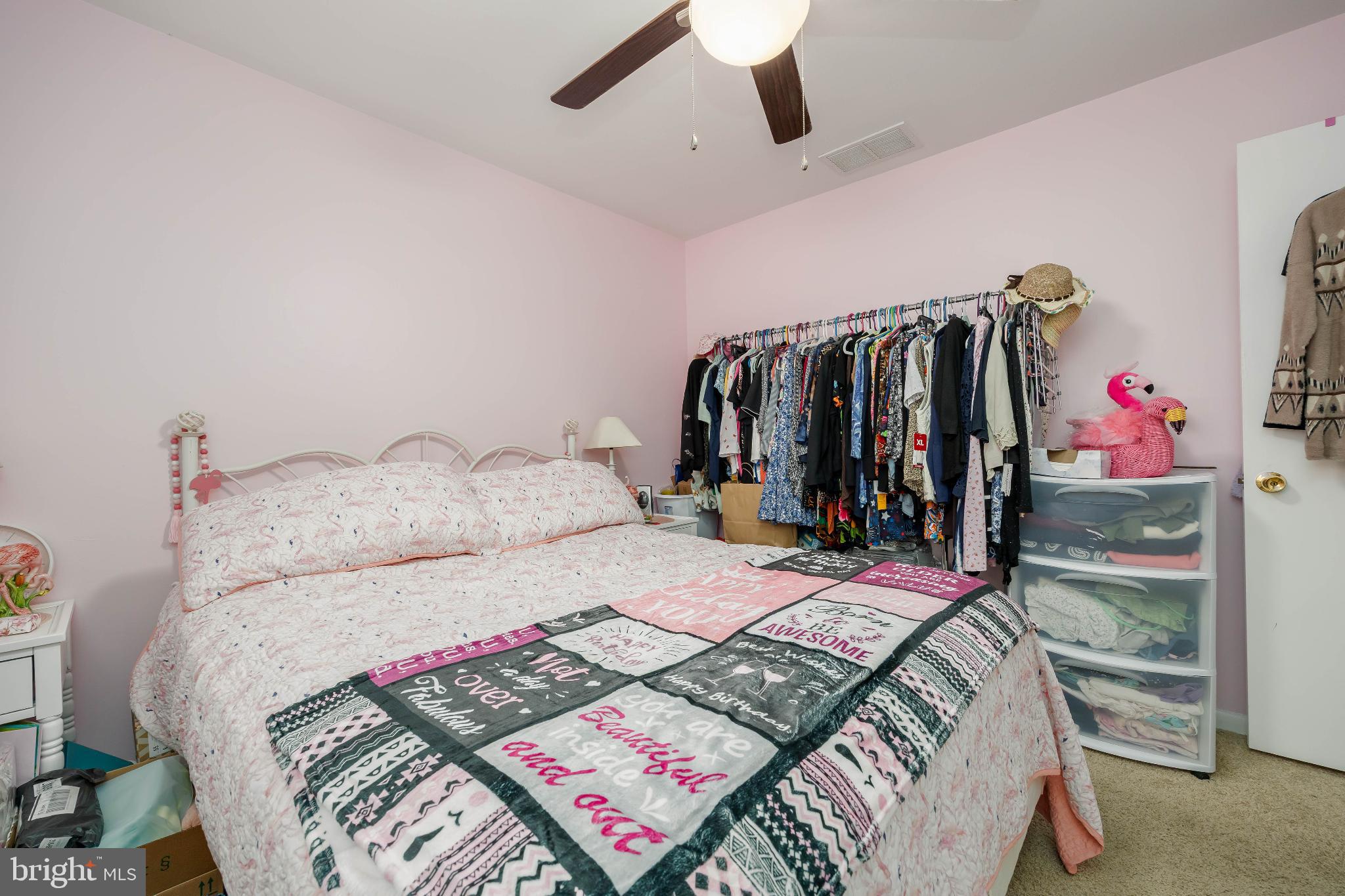 136 Marvel Road Salisbury, MD 21801 - Photo 27 of 42 a bed room with a bed and a walk in closet