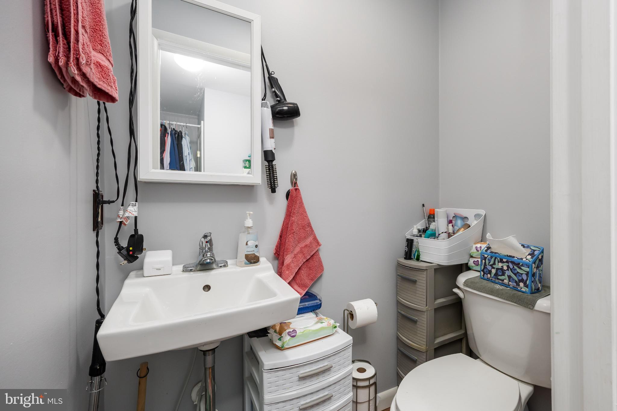 136 Marvel Road Salisbury, MD 21801 - Photo 29 of 42 a bathroom with a sink toilet and a mirror