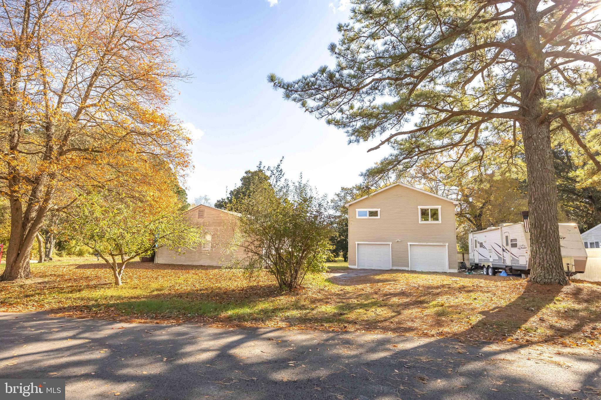 136 Marvel Road Salisbury, MD 21801 - Photo 41 of 42 a house that has a tree in front of it