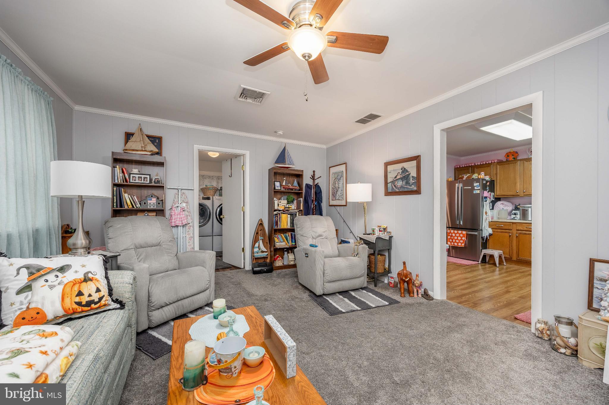 136 Marvel Road Salisbury, MD 21801 - Photo 7 of 42 a bedroom with furniture and a chandelier