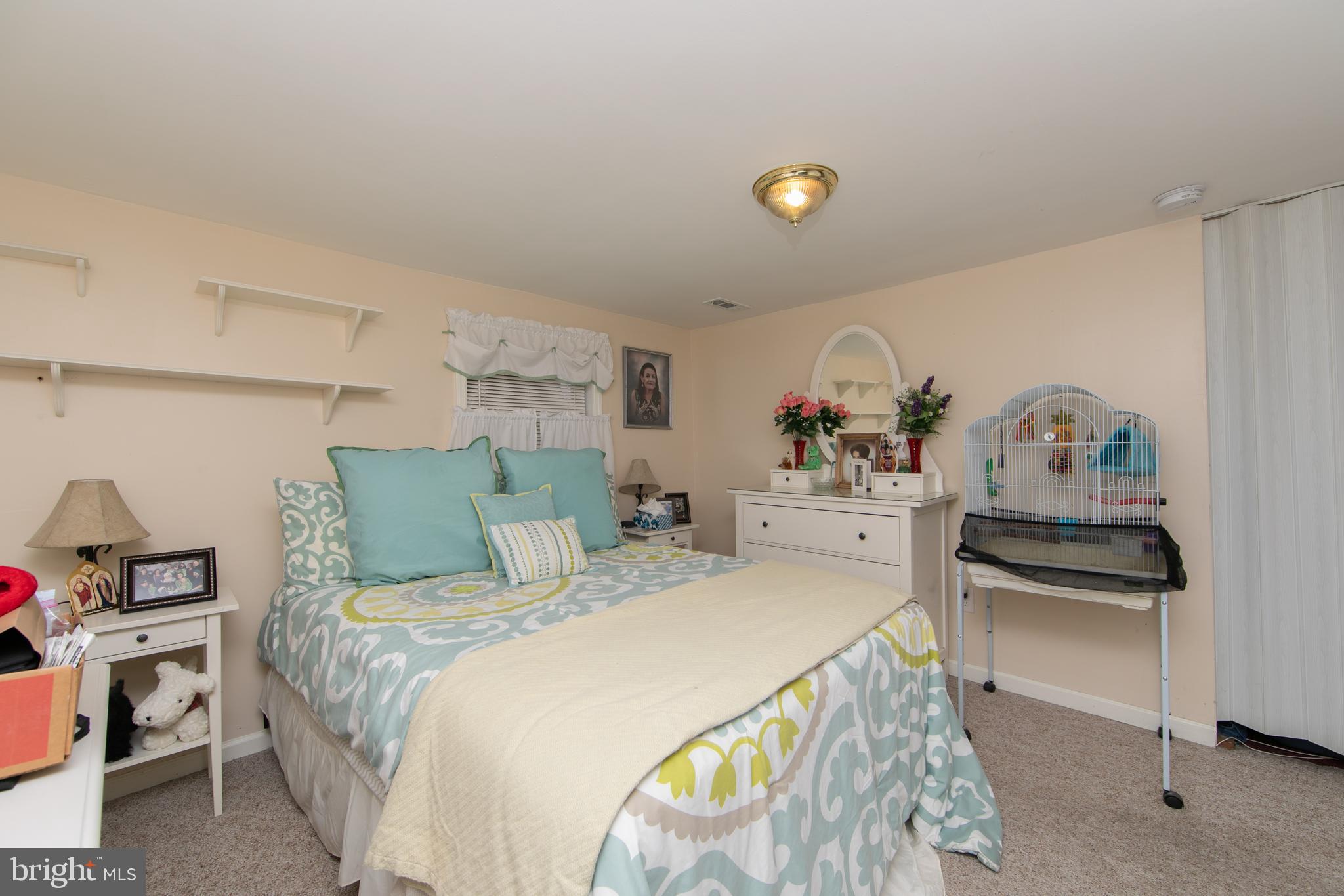 614 West 5th Street Palmyra, NJ 08065 - Photo 13 of 30 a bedroom with a bed and a dresser