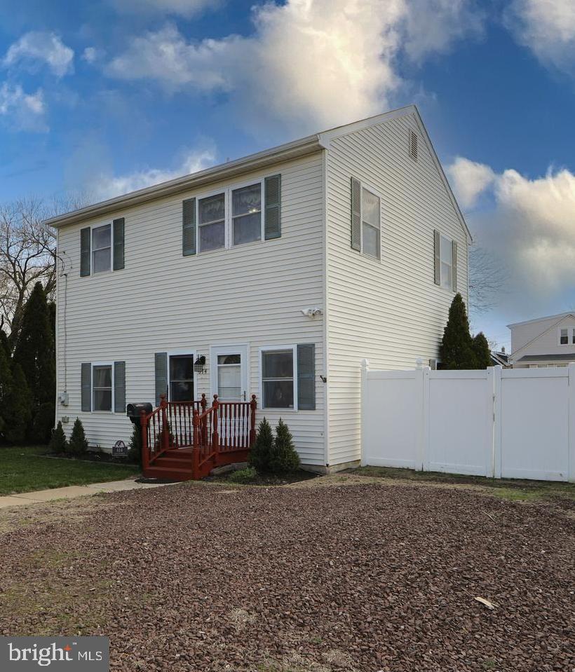 614 West 5th Street Palmyra, NJ 08065 - Photo 2 of 30 a view of a house with backyard