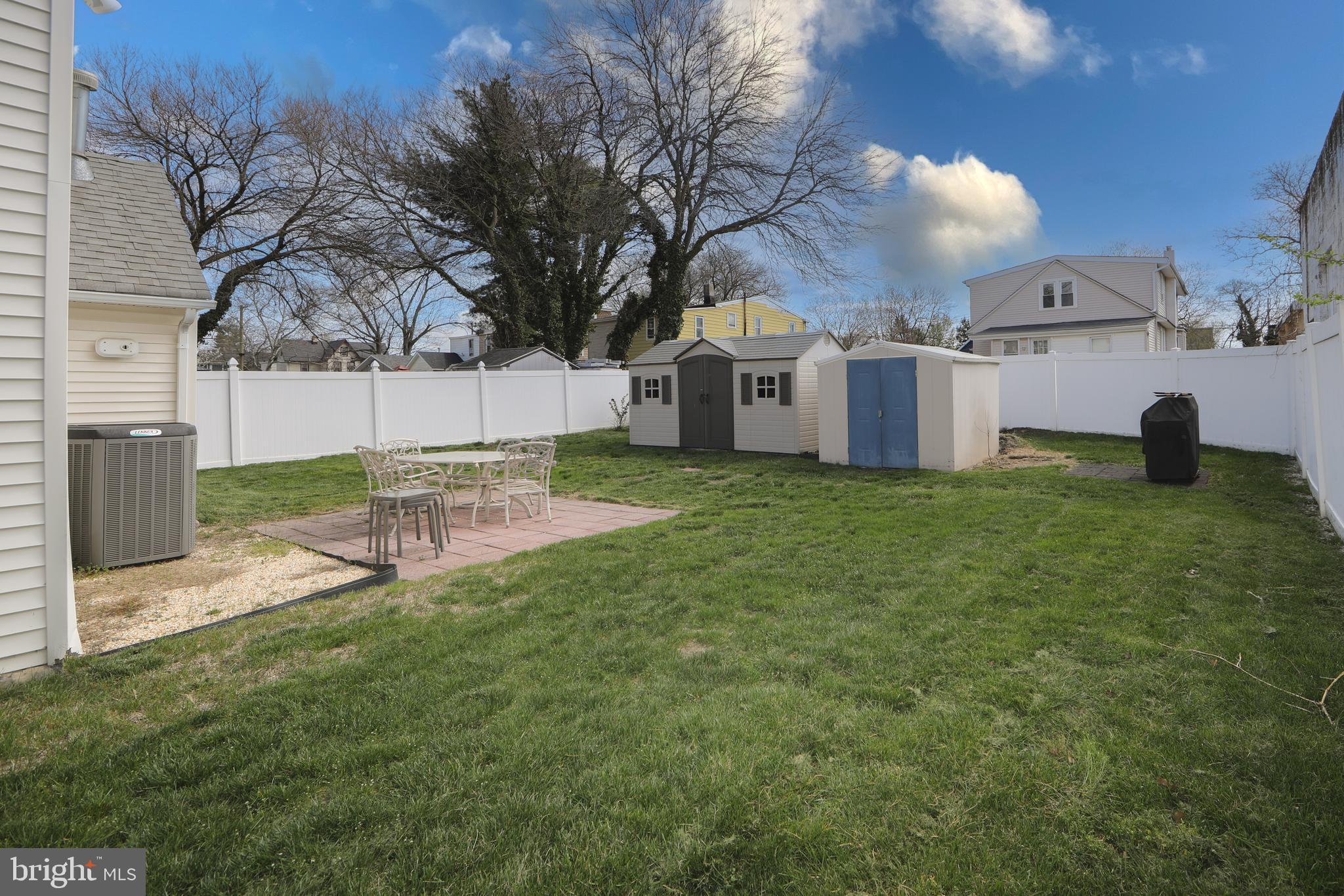 614 West 5th Street Palmyra, NJ 08065 - Photo 3 of 30 a white house with a big yard and large trees