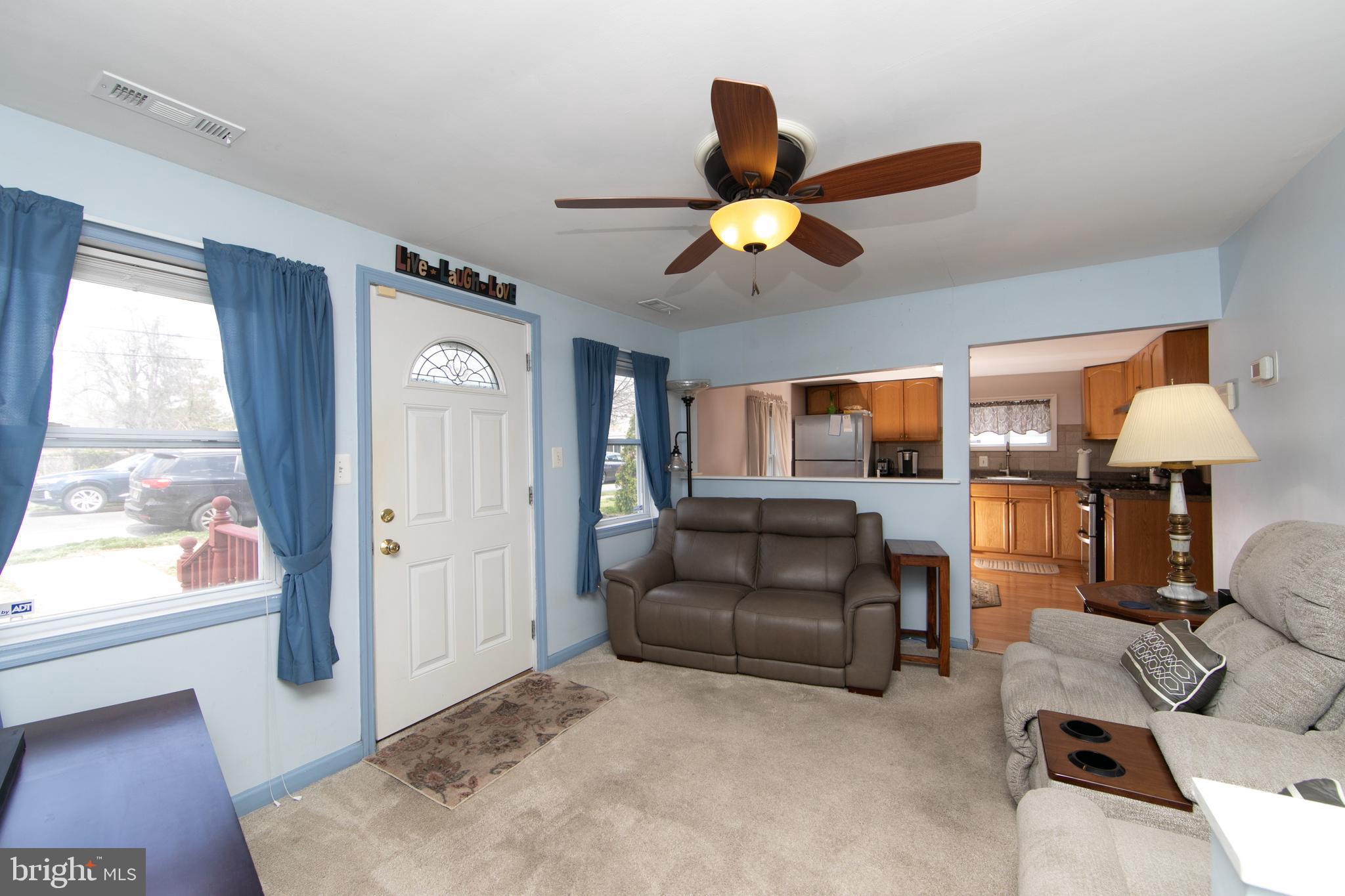 614 West 5th Street Palmyra, NJ 08065 - Photo 6 of 30 a living room with furniture and a window