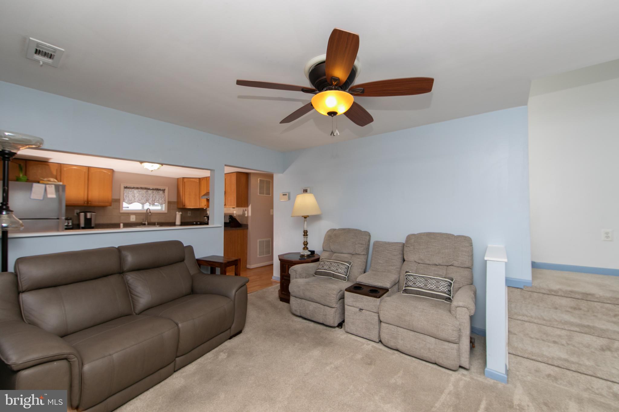 614 West 5th Street Palmyra, NJ 08065 - Photo 8 of 30 a living room with furniture and a lamp