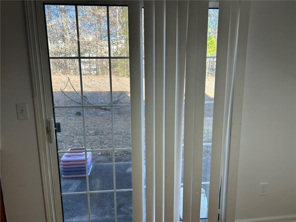 2099 Meadow Peak Road Duluth, GA 30097 - Photo 11 of 13 a bathroom with a glass shower door