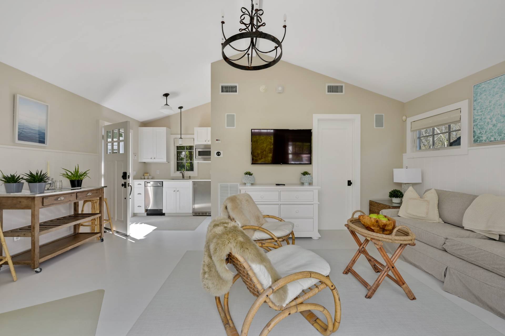 5 Ridge Drive Sag Harbor, NY 11963 - Photo 22 of 27 a living room with furniture a dining table and chairs