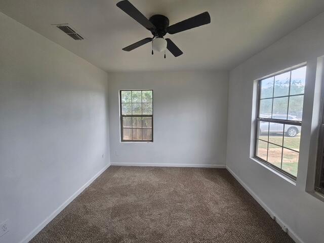 3218 Colgate Street Lubbock, TX 79415 - Photo 4 of 6 a view of an empty room with a window