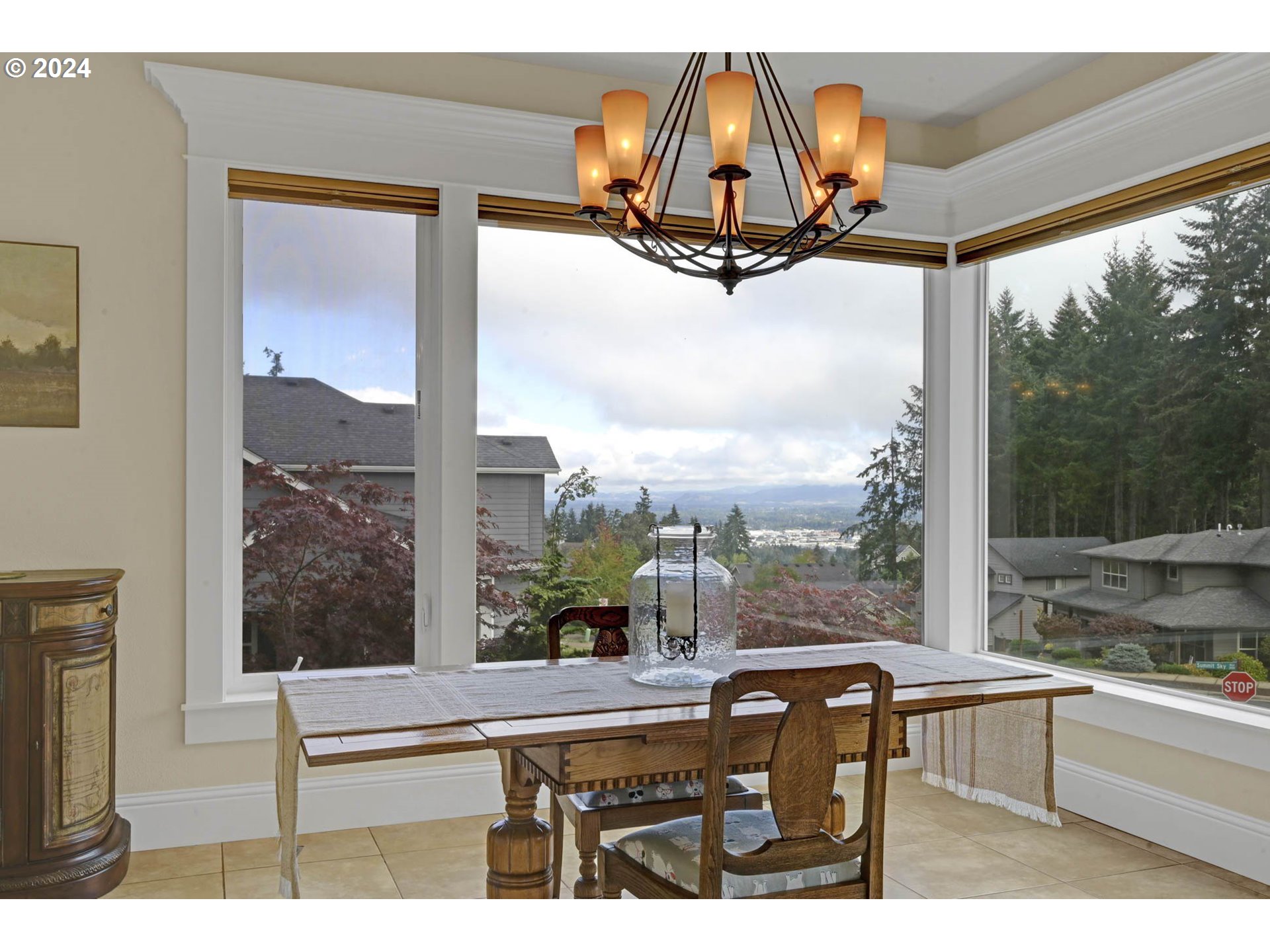 3587 Summit Sky Boulevard Eugene, OR 97405 - Photo 12 of 45 a view of a porch with a table and chairs