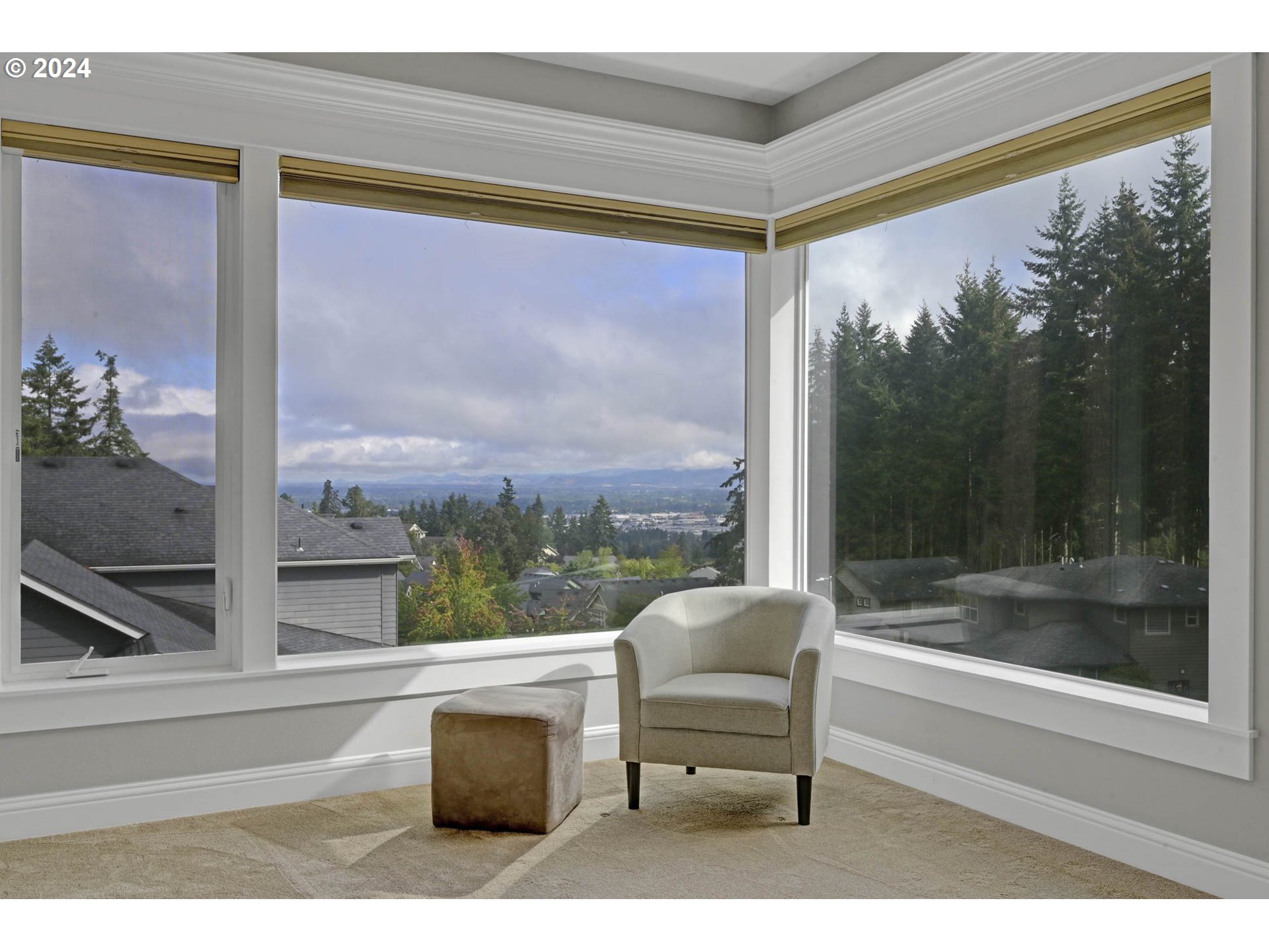 3587 Summit Sky Boulevard Eugene, OR 97405 - Photo 30 of 45 a living room with a large window and a table