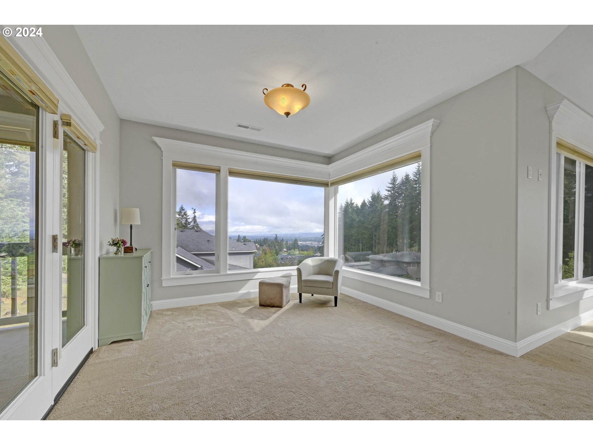 3587 Summit Sky Boulevard Eugene, OR 97405 - Photo 36 of 45 a living room with furniture and a large window