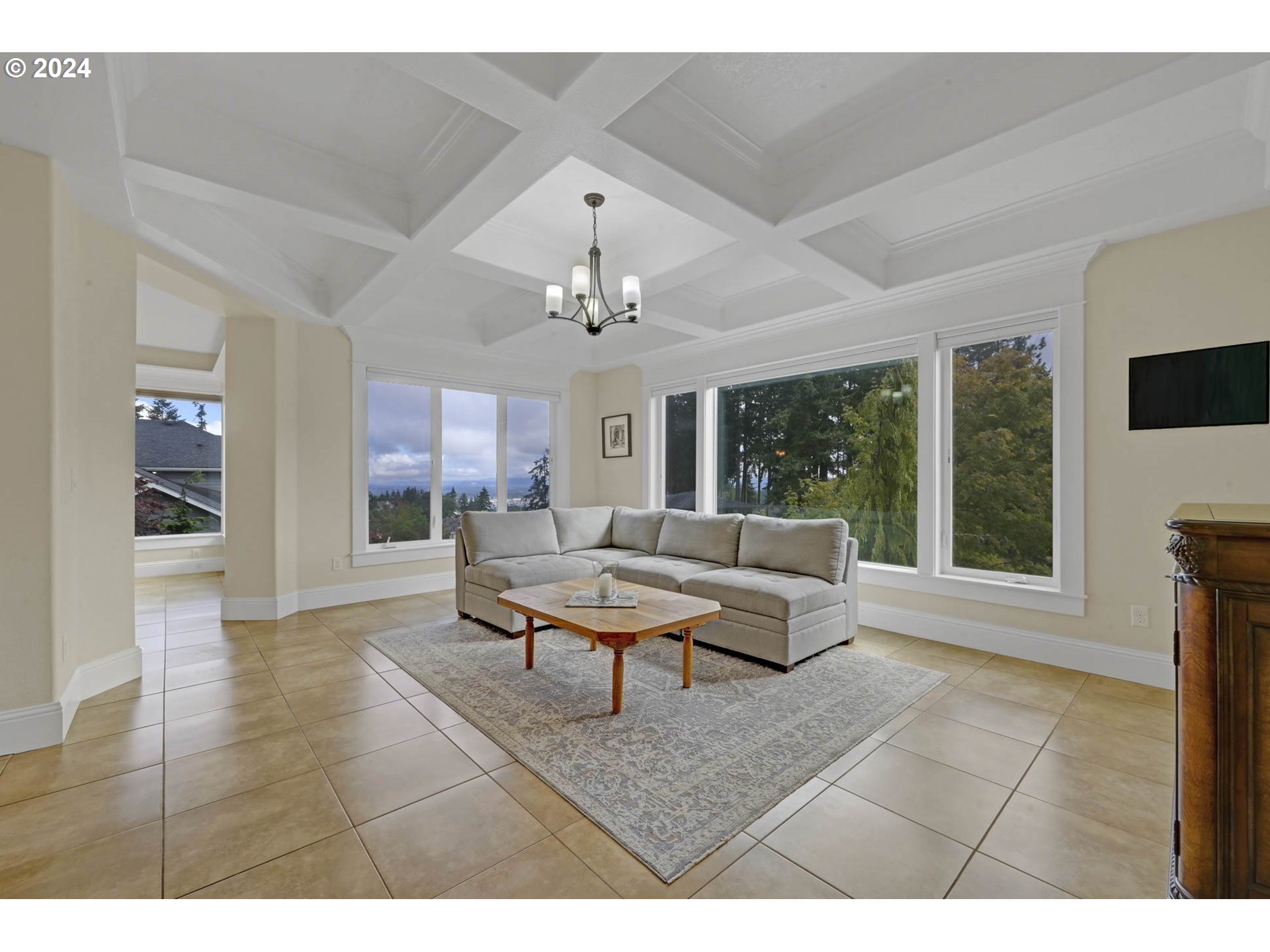 3587 Summit Sky Boulevard Eugene, OR 97405 - Photo 7 of 45 a living room with furniture and a chandelier