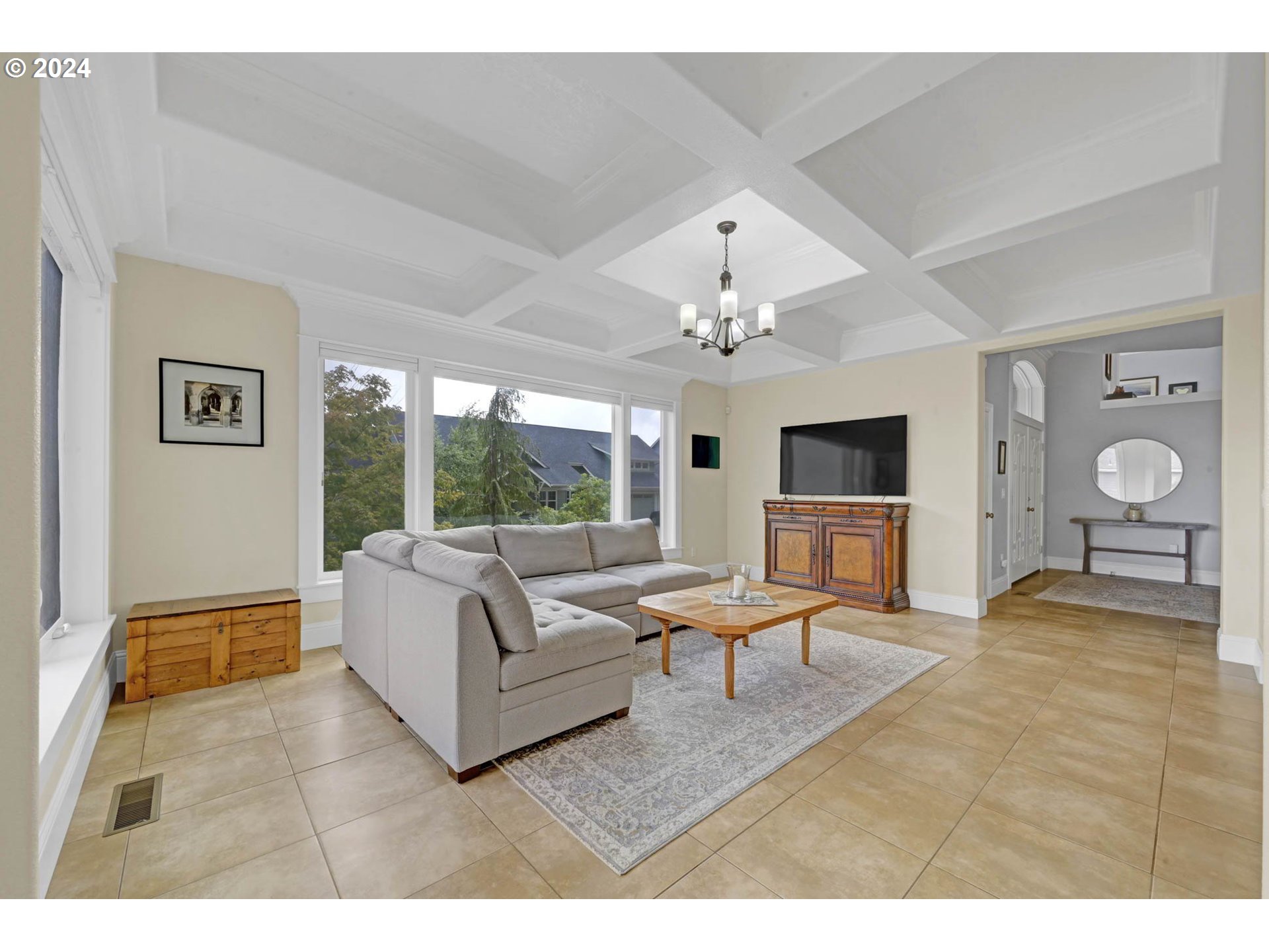 3587 Summit Sky Boulevard Eugene, OR 97405 - Photo 8 of 45 a living room with furniture a chandelier and a large window