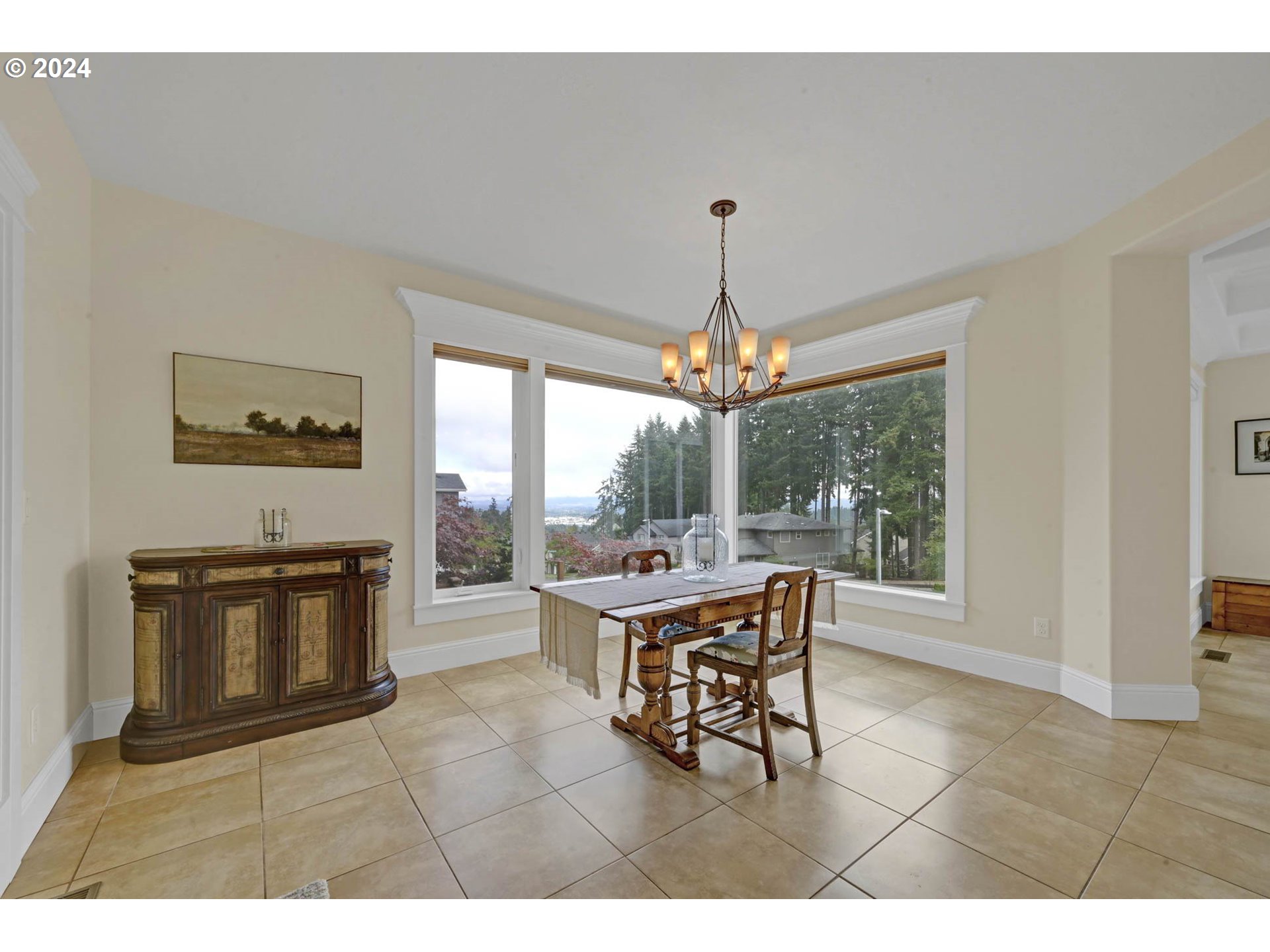 3587 Summit Sky Boulevard Eugene, OR 97405 - Photo 10 of 45 a living room with furniture a window and a kitchen