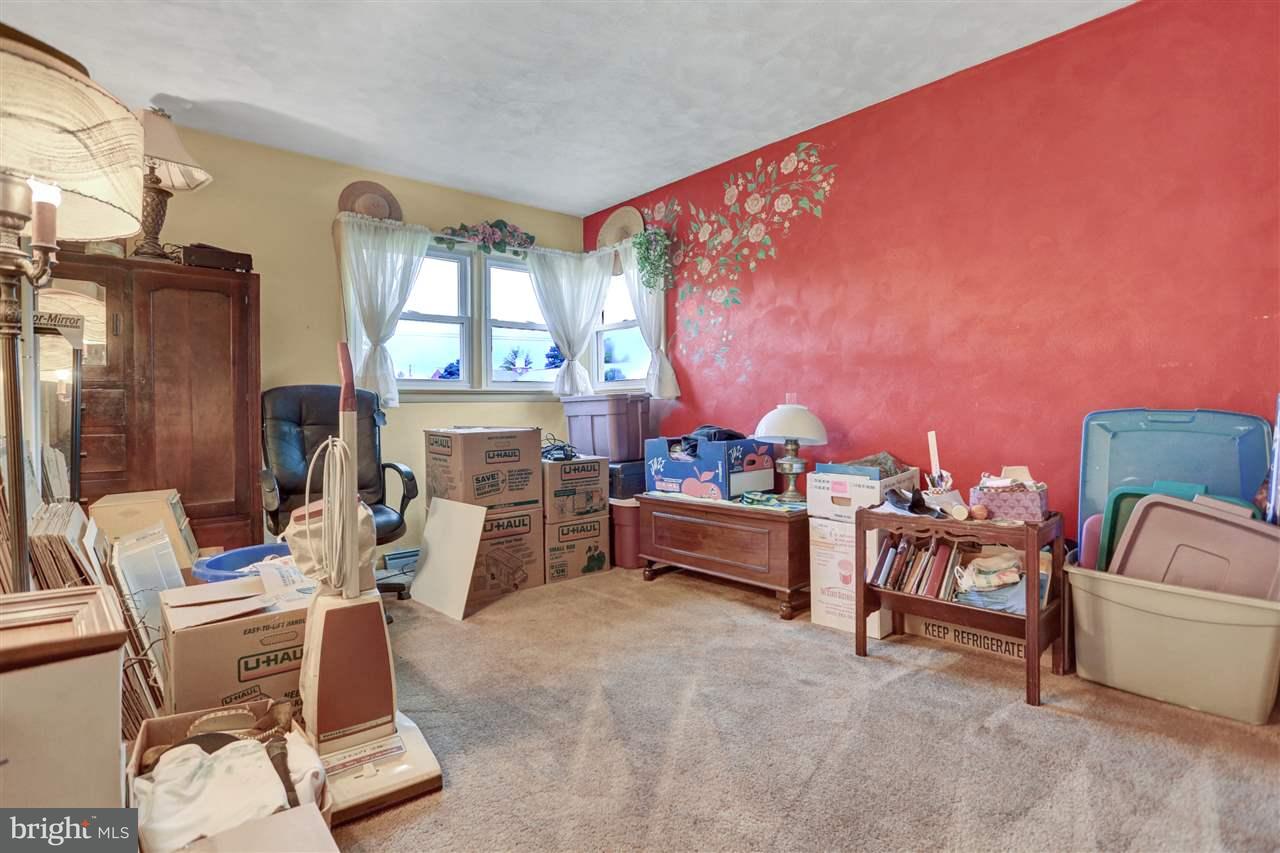 2238 Sycamore Road York, PA 17408 - Photo 22 of 32 a living room with furniture and a fireplace
