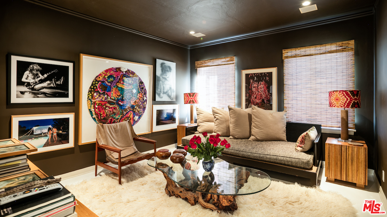 2818 Grayson Avenue Venice, CA 90291 - Photo 8 of 16 a living room with furniture a rug and a fireplace