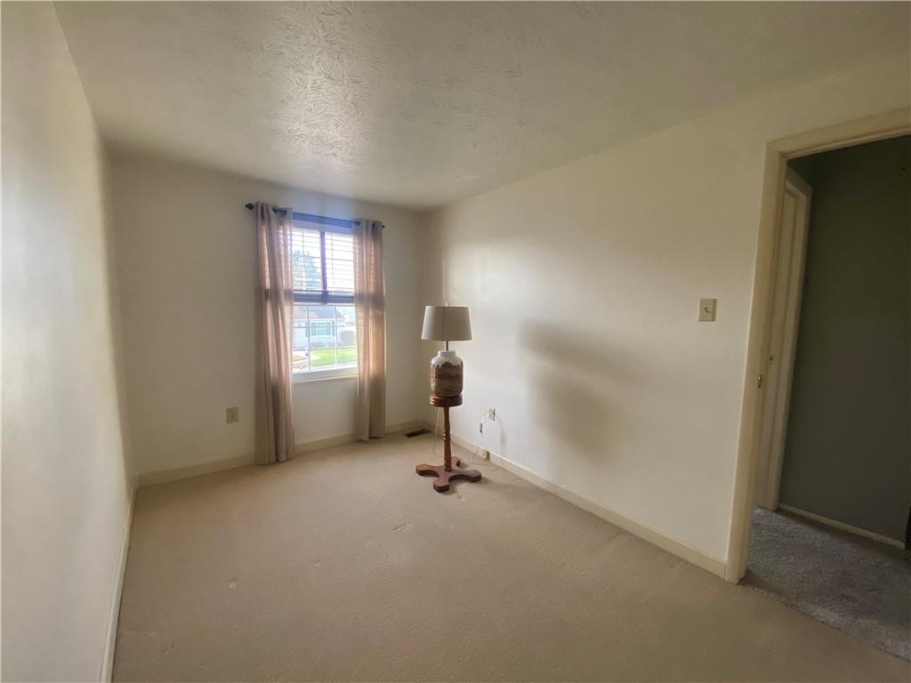744 North Gross Street Conway, PA 15027 - Photo 15 of 29 a view of a room with gym equipment and a window