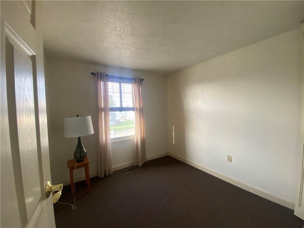 744 North Gross Street Conway, PA 15027 - Photo 18 of 29 an empty room with windows