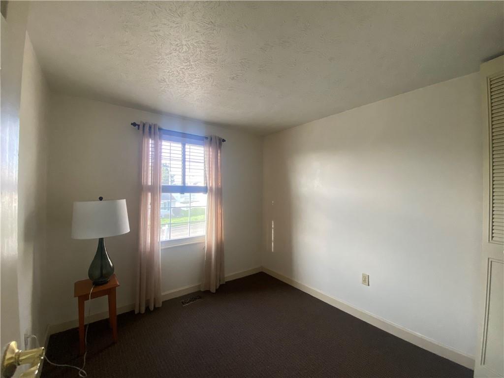 744 North Gross Street Conway, PA 15027 - Photo 20 of 29 a view of an empty room and window