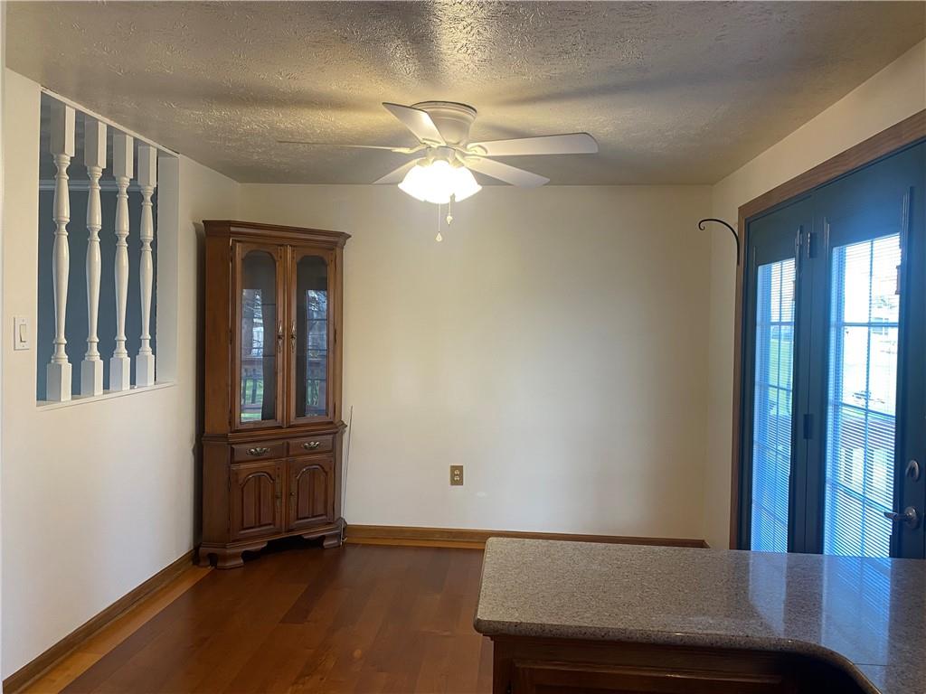 744 North Gross Street Conway, PA 15027 - Photo 10 of 29 wooden floor in an empty room with a window