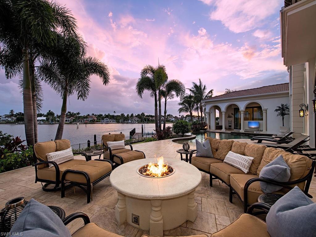 2615 Tarpon Road Naples, FL 34102 - Photo 1 of 20 swimming pool with outdoor seating