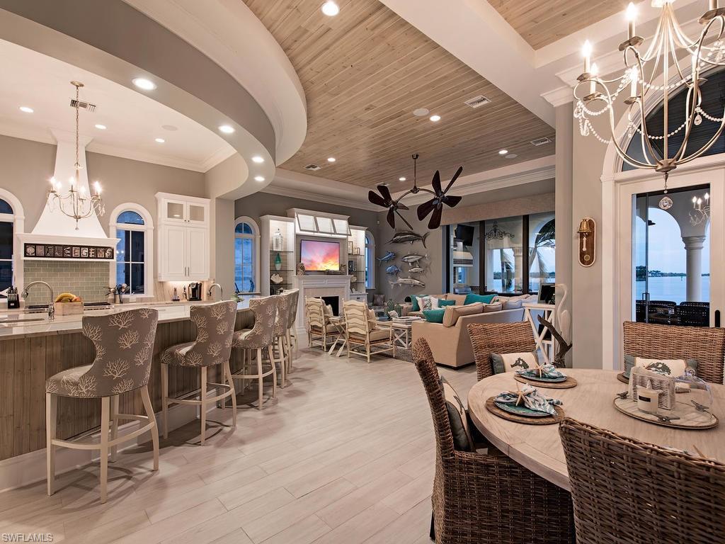 2615 Tarpon Road Naples, FL 34102 - Photo 8 of 20 a view of a dining room with furniture