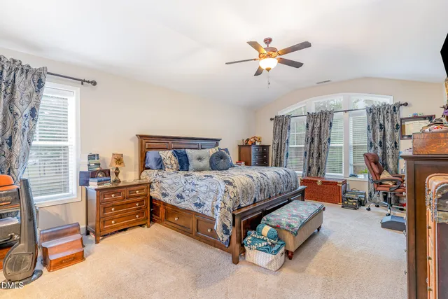 a bathroom with a sink double vanity and a mirror