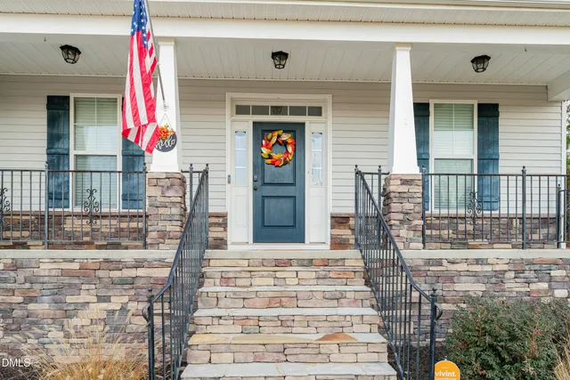 a view of balcony with furniture