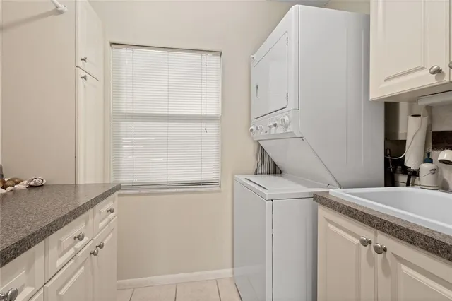 a front view of a house with outdoor seating and plants