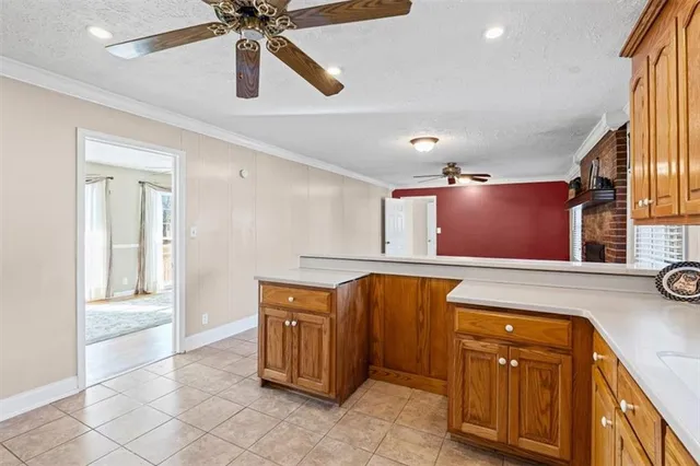 a kitchen with stainless steel appliances granite countertop a sink and cabinets