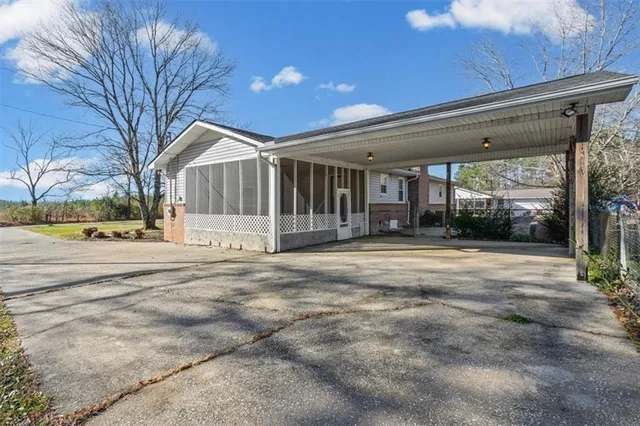 a backyard of a house with lots of green space