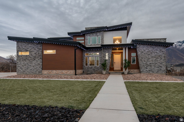 262 North Santa Fe Drive Mapleton, UT 84664 - Photo 4 of 28 View of front of property featuring stone siding and a front lawn