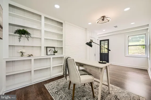 a workspace with wooden floor