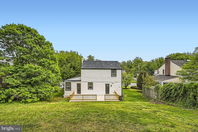 a house with a tree in front of it