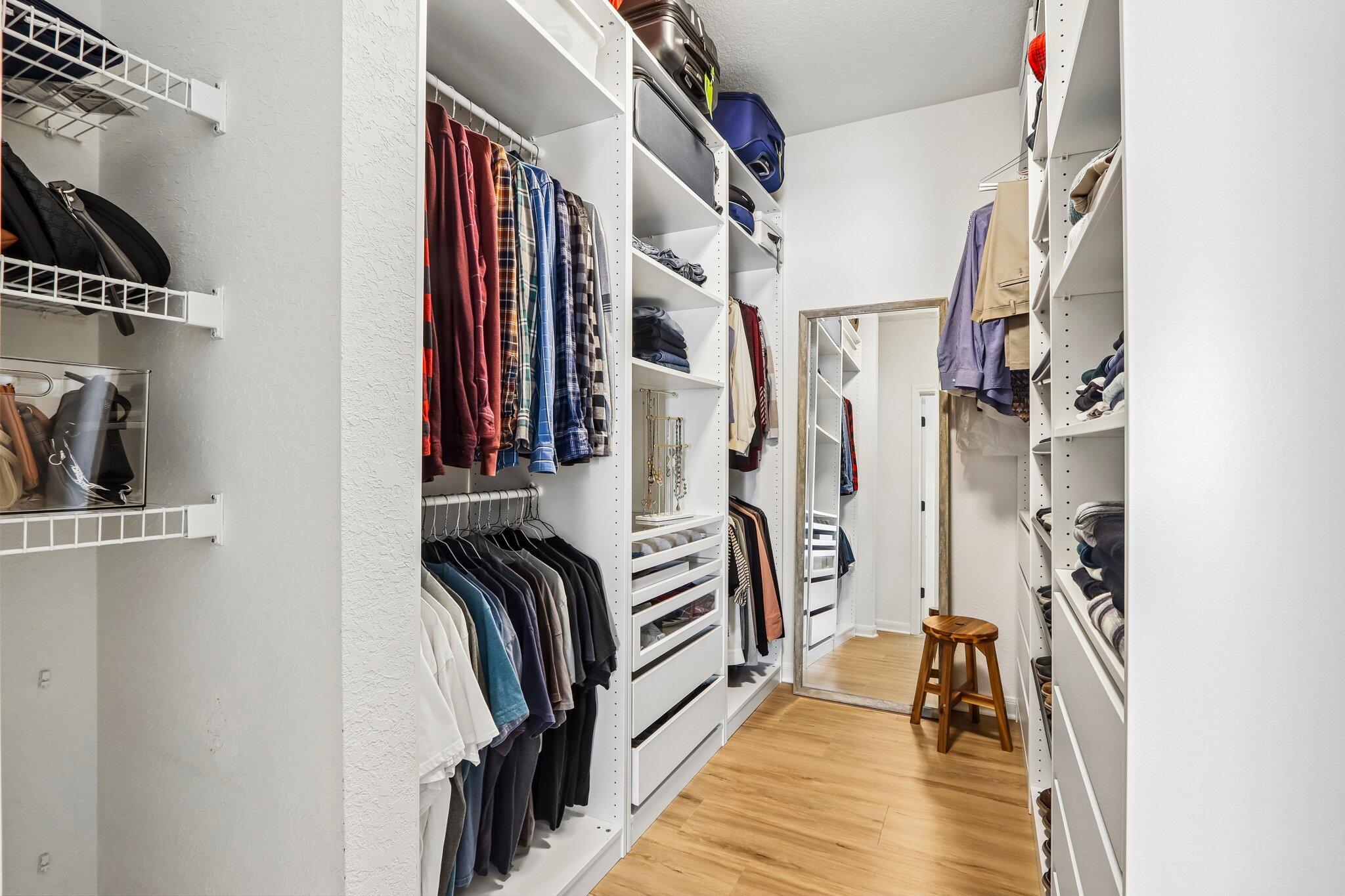 N16-w26539 Tall Reeds Lane, Unit A Pewaukee, WI 53072 - Photo 10 of 32 Primary Walk in Closet with IKEA storage system