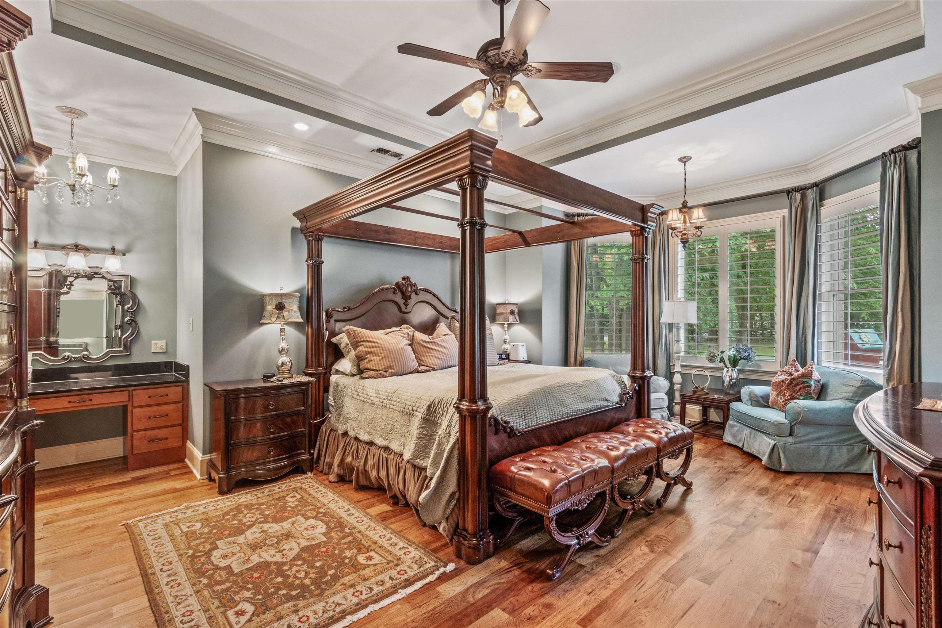150 Ridgecrest Drive Arlington, TN 38002 - Photo 19 of 40 Spacious bedroom featuring wood-finish flooring, crown molding, and a ceiling fan with integrated lighting