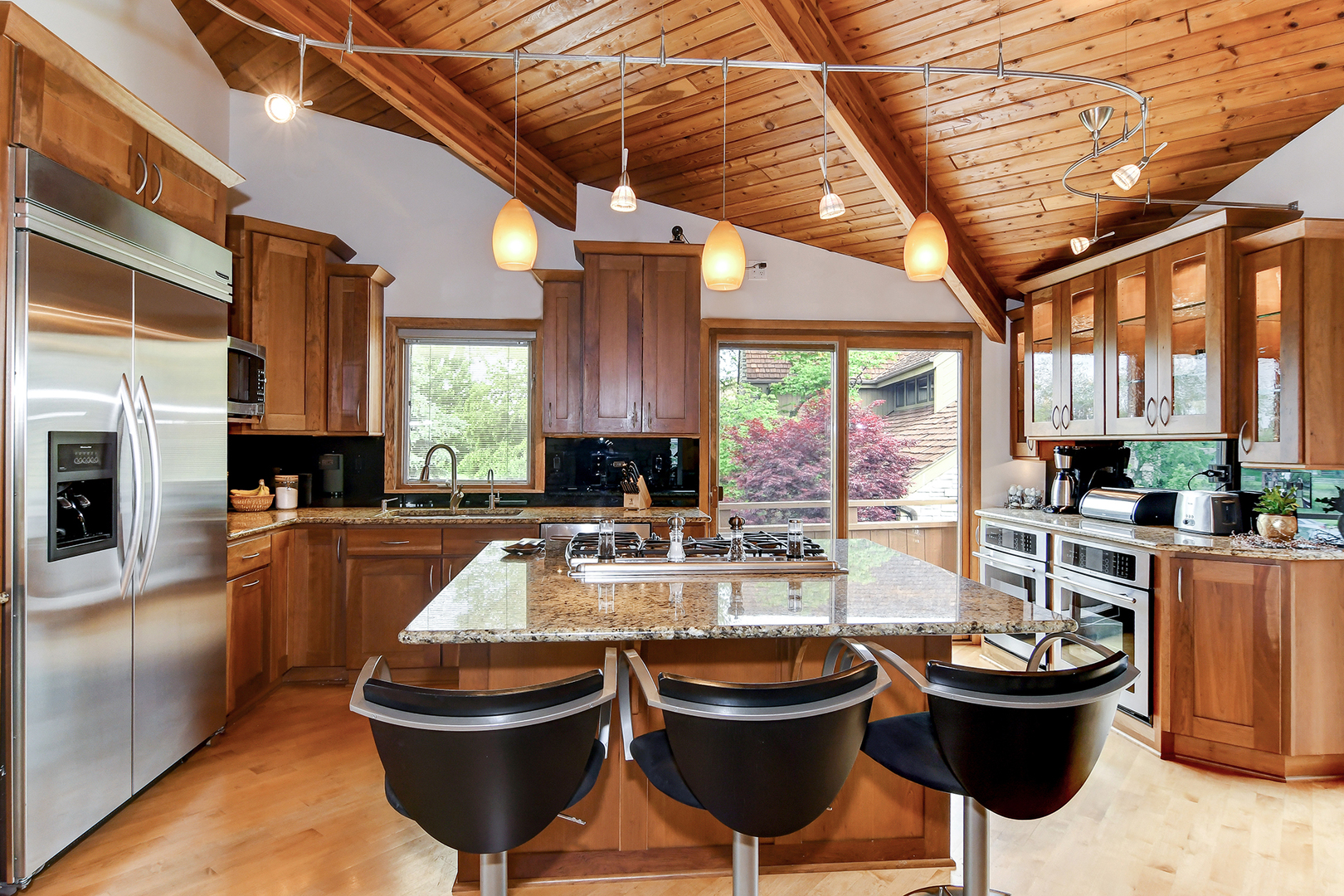 39 Fawn Court Burr Ridge, IL 60527 - Photo 11 of 46 a kitchen with a stove a sink and a refrigerator