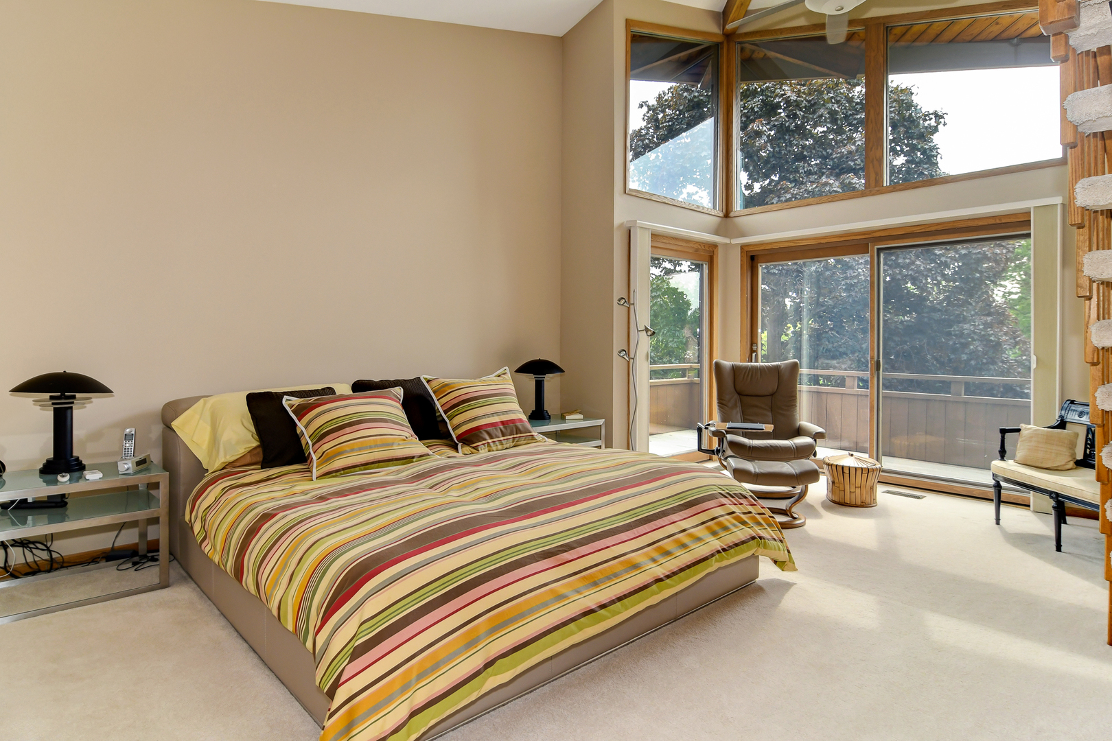 39 Fawn Court Burr Ridge, IL 60527 - Photo 15 of 46 a bedroom with a bed and a large window with outer view